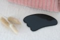 Le gua sha en obsidienne
